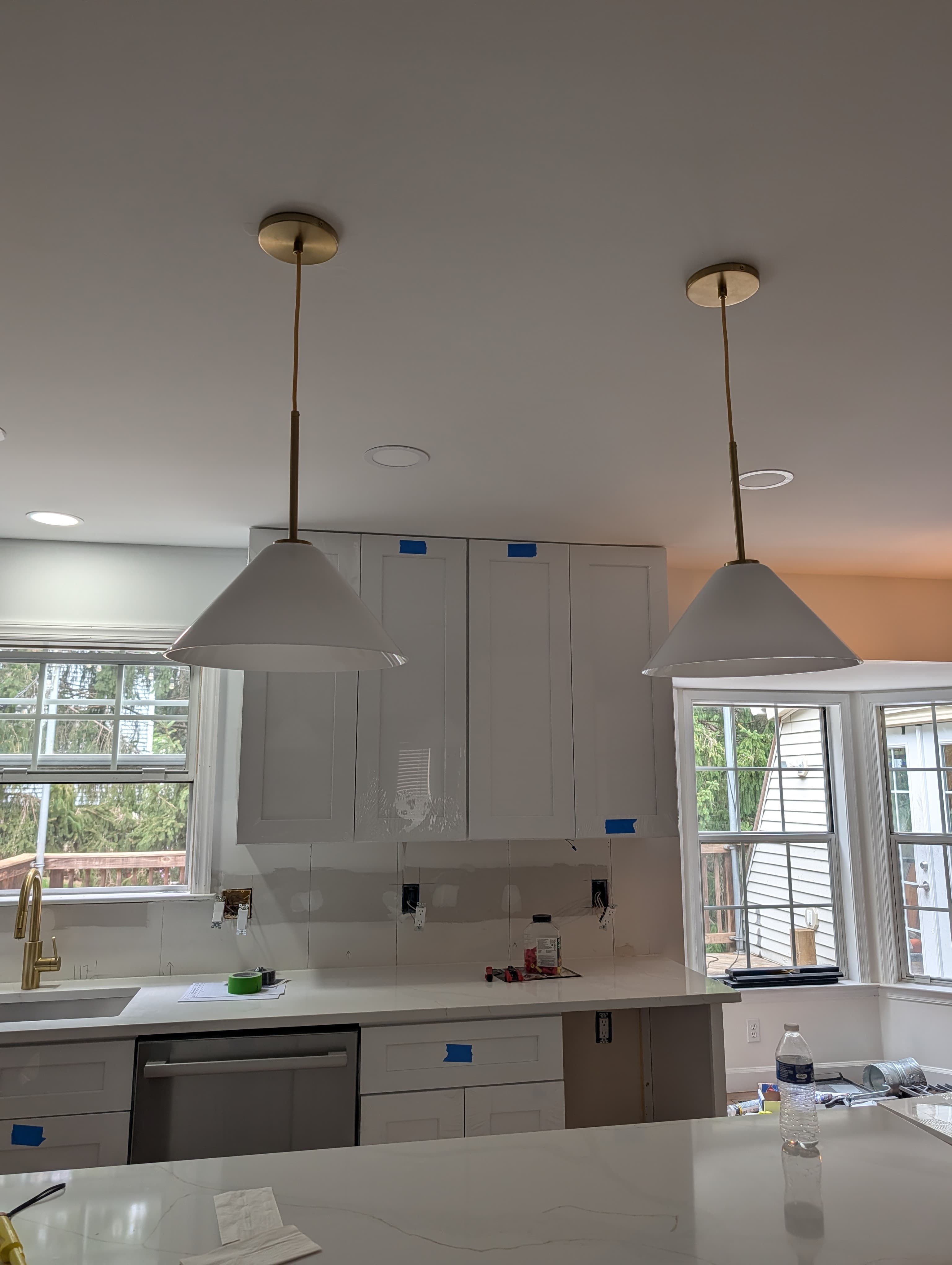 Built-in storage bench with open cubbies and drawers, part of the same Herndon kitchen project